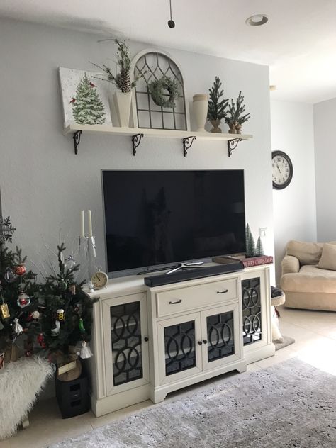 Living Room Decor Over Tv, Decorating Tv Stand Shelves, Decorating The Wall Behind The Tv, Above Tv Wall Decor Living Room Stand, Decorating Above Tv Stand, Behind Tv Decor Wall, Long Shelf Over Tv, Decorating Behind Tv, Decorate Above Tv Wall