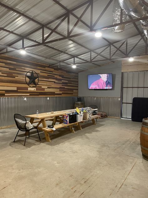 Inside Metal Shop Ideas, Shop Hangout Ideas, Metal Shop Interior Ideas, Pole Barn Bar, Party Barn Ideas, Pole Barn Lighting, Rustic Garage Ideas, Garage Shop Ideas, Party Barn Interior