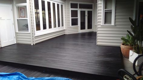 Merbau deck sanded then oiled using Black Japan pigment then finished with Clear Black Japan Stain, Black Stained Deck, Black Deck Stain, Courtyard Decking, Black Decking Ideas, Weatherboard Exterior, Merbau Decking, Deck Stain Colors, Deck Restoration