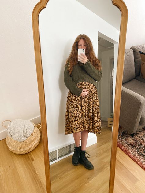 Fall maternity outfit idea with leopard midi skirt, doc marten boots, green high neck chunky knit crop sweater for true autumn color palette for red/auburn hair Cropped Sweater Maternity, Doc Martens Maternity Outfit, True Autumn Color Palette, Red Auburn Hair, Leopard Midi Skirt, Doc Marten Boots, Fall Maternity Outfits, Autumn Color Palette, Doc Marten Boot