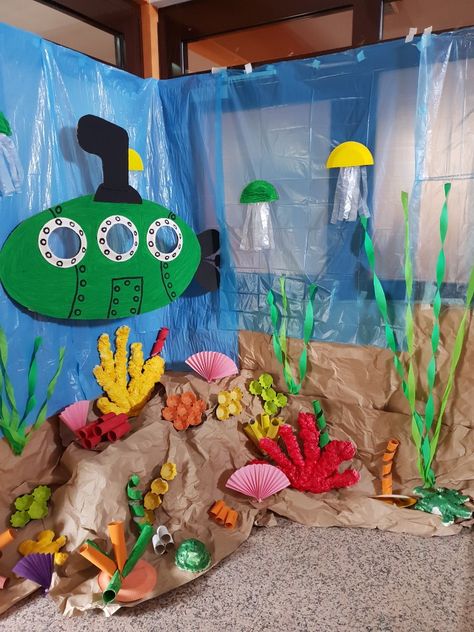 Under The Sea Poster Board, Submarine Classroom Decorations, Under Water Theme Decorations, Under The Sea Window Display, Ocean Library Display, Ocean Decorations Diy, Under The Sea Theme Decorations, Under The Sea Library Theme, Under Water Classroom Theme