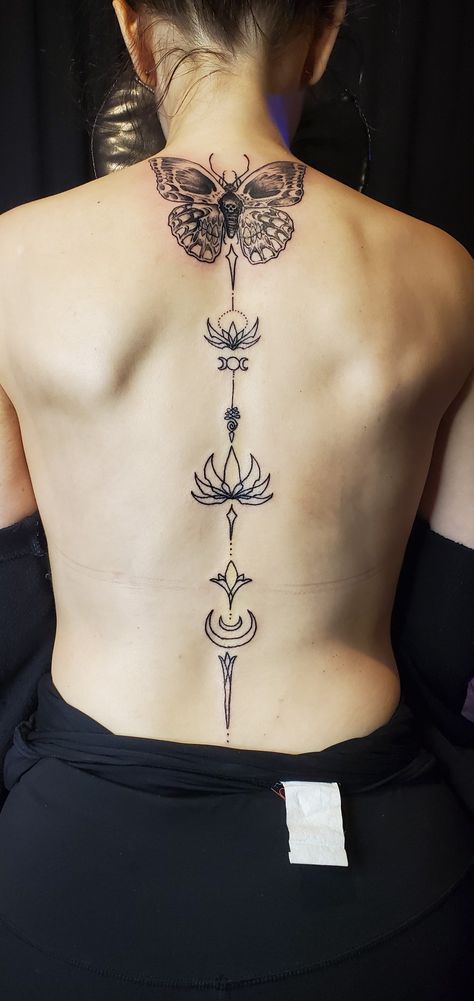 Spine tattoo lotus flower and skull butterfly Moth Spine Tattoo, Skull Spine Tattoo, Tattoo Lotus Flower, Tattoo Lotus, Skull Butterfly, Spine Tattoo, Spine Tattoos, Future Tattoos, Lotus Flower