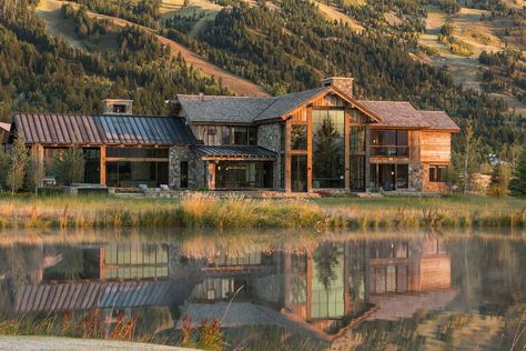 Delightful rustic home in Wyoming with a dramatic mountain backdrop Rustic House Exterior, Wood Shutters Exterior, Rustic Mountain Homes, Wood Siding Exterior, Mountain Home Exterior, Mountain Backdrop, Rustic House Plans, Country Cottage Decor, Shutters Exterior