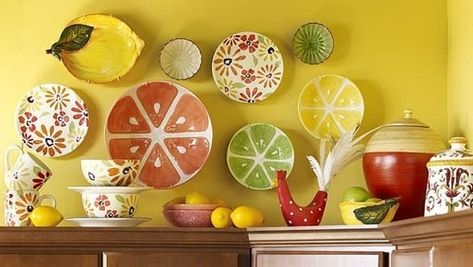 Lemon Theme Kitchen | Choose Interesting Accent Pieces How To Decorate Above Cabinets, How To Decorate Above Kitchen Cabinets, Above Cabinet Decor, Citrus Kitchen, Decor Above Cabinets, Decorating Above Kitchen Cabinets, Above Cabinets, Above Kitchen Cabinets, Lemon Kitchen