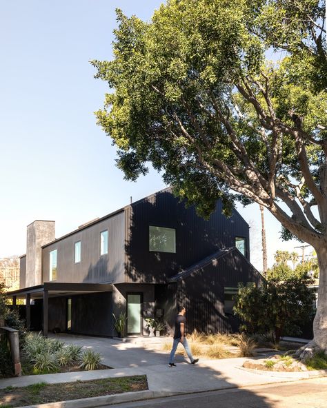 The Black Barn by Laney LA - Dwell Bright White Interior, Black Barn, Dunn Edwards, Unique House Design, Wood Stairs, Modern Barn, Black Exterior, Cozy Place, Home Designs