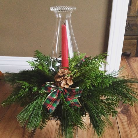 Christmas Centre piece with a variety of fresh greens and and antique oil lamp shade. Oil Lamp Christmas Centerpiece, Oil Lamp Christmas Decor, Wedding Oil Lamp Decorations, Oil Lamp Centerpiece Wedding Vintage, Lamp Christmas Decor, Oil Lamp Centerpiece, Lamp Centerpiece, Oil Lamp Green, Christmas Centre Pieces