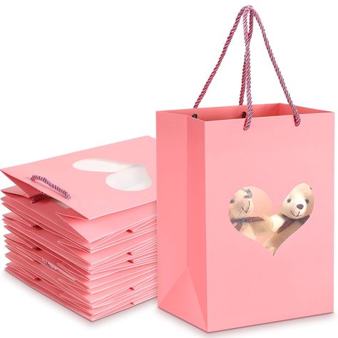 PRICES MAY VARY. Packing List: you will receive 12 paper bags with handles and tags, the sufficient quantity enough to meet your daily using needs and replacement needs; You can also share them with your friends or guests Product Size: each Valentine's Day gifts bag measures about 7.0 x 5.12 x 9.84 inches/ 18 x 13 x 25 cm, the large size can hold all kinds of party gifts, like pencils and notebooks, cookies, chocolate, candy, cups, aprons, candles, perfumes, dresses and other small stuff Romanti Heart Shaped Paper, Gift Wrap Bag, Candy Cups, Valentine Party Favors, Valentines Gift Bags, Valentine Party, Cookies Chocolate, Valentine Anniversary, Small Stuff