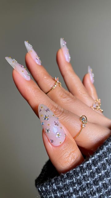 San Sung Kim | 김산성 on Instagram: "🎀🌸💗 … I fell in love with my new @shopgirlscrew rings* that I had to create a set entirely based on the dainty details. I wish you could see these rings paired w/ my nails in real life. I can’t stop staring at them because my hands have never looked this good. *PR/gifted **Rhinestones from Amazon sf (link in bio)" Gem Nails Rhinestones, Nails With Gems Rhinestones, Gem Nail Art, Nails Gems, Groovy Nails, Nail Tricks, Gem Nail Designs, Rhinestones Nails, Nails Rhinestones