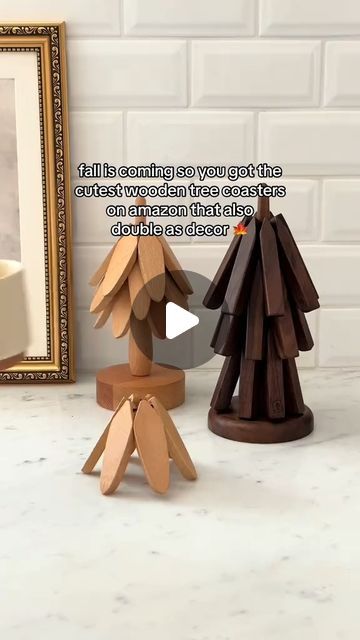 Chic & Sleek on Instagram: "Leave 'tree' if you want to know more!✨ 🌲✨ Wooden Trivets for Hot Dishes – Add a festive and functional touch to your kitchen! This tree-shaped trivet set includes 4 beautifully crafted walnut wood trivets stored on a stand that resembles a Christmas tree.   [tree trivet, trivet, trivets, tree coasters, wooden trivet tree, trivet tree, wooden, christmas tree trivet, magnetic trivet, wooden tree coasters, tree coaster, wooden kitchen accessories]  #TreeTrivet #Trivet #Trivets #Coasters #TrivetTree #Wooden #ChristmasTreeTrivet #MagneticTrivet #TreeCoaster #WoodenKitchenAccessories #PotHolders #PanProtectors #amazonfinds #homehacks #amazonhome #amazonmusthaves #amazonfavorites #amazonhomefinds #forthehome #homefinds #founditonamazon #homedecor" Magnetic Trivet, Wooden Trivets, Wooden Kitchen Accessories, Coasters Wooden, Wood Trivets, Wooden Christmas Tree, Fall Is Coming, Tree Tree, Hot Dishes