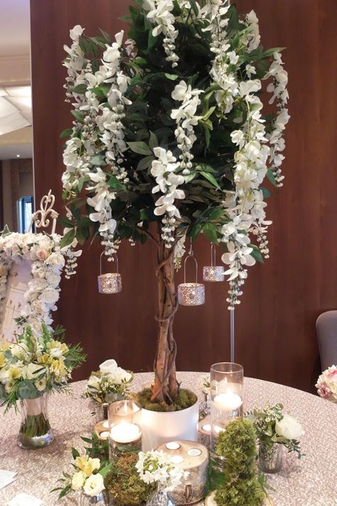 Wedding tree centrepieces - wisteria tree hire - cheshire weddings - Laurel Weddings - www.laurelweddings.com Tree Centrepiece Wedding, White Wedding Flowers Centerpieces, Tree Wedding Centerpieces, Wisteria Wedding, Wedding Tree Decorations, Silk Wedding Flowers, Wisteria Tree, Wedding Tree, Tree Centerpieces