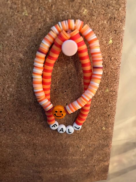 Two fall themed bracelets that look great together or apart. Clay Bead Bracelet Inspo Fall, Clay Beads Bracelet Ideas Fall, Autumn Clay Bracelets, Fall Braclets Ideas, Fall Themed Clay Bead Bracelets, Heishi Bracelet Ideas Fall, Cute Fall Bracelets, Fall Braclets Clay Bead, Fall Clay Braclets