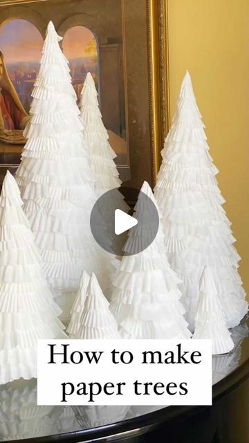 Lindsay Daniel on Instagram: "How to Make Paper Trees  Supplies needed: White poster board String Pencil Scissors White coffee filters White jumbo cupcake liners White regular cupcake liners (optional) Hot glue gun Hot glue sticks  1. Attach pencil to string. Hold string in place at one corner of the poster board, with pencil at the opposite corner. Draw an arc that is roughly a quarter circle.  2. Repeat with the remaining poster board with smaller arcs. I was able to get 2-3 cones out of one piece of poster board.   3. Cut out cone shapes.   4. Roll into cone and hot glue together. I thought this was the hardest step. It takes some patience. Trim the bottom of cone to make it even.  5. Repeat with smaller cones. I found these instructions and photos helpful (plus you can see an additiona How To Make A Cone Out Of Poster Board, Foam Cone Trees Christmas Diy, How To Make Paper Cones, Paper Mache Cone Christmas Tree, Coffee Filter Trees, Diy Cone Trees Christmas, How To Make A Paper Cone, How To Make A Cone, How To Make A Cone Out Of Paper