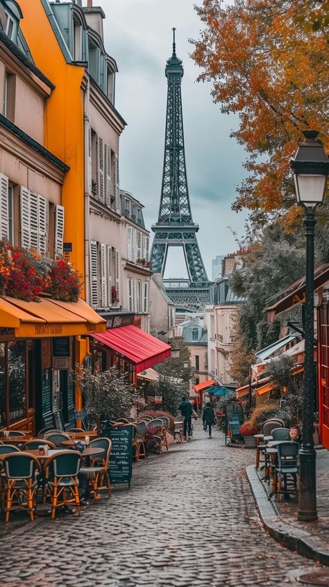 Parisian Cobblestone Charm: A quaint Paris street lined with cafes and vibrant awnings leads to the iconic Eiffel Tower. #paris #cobblestones #eiffel tower #cafes #autumn #aiart #aiphoto #stockcake ⬇️ Download and 📝 Prompt 👉 https://ayr.app/l/qk2c Paris Street Photography, Paris Alleyway, Paris Street Cafe, Paris Streets, Sidewalk Cafe, Parisian Cafe, French Street, Beautiful Paris, Star City