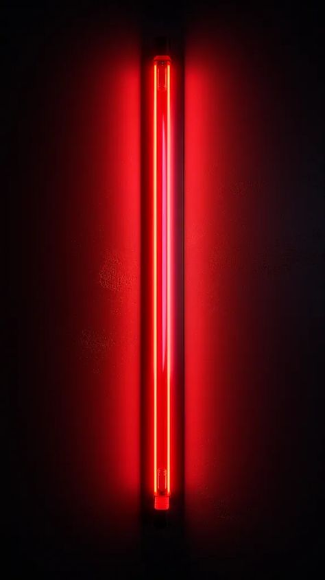 The image is a photograph of a red neon light. The light is mounted on a dark wall and is turned on. The light is glowing brightly and is casting a red glow on the wall. The photograph is taken from a low angle, which makes the light appear to be taller than it actually is. The light is the only source of illumination in the photograph, and it is creating a dramatic and somewhat eerie atmosphere. Interior Design Brief, Red Neon Lights, Argo 2, Led Rouge, Red Neon, Red Lights, Dark Wall, Low Angle, Red Rooms