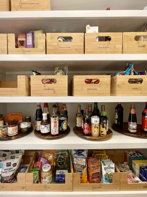 PANTRY UPDATE🥫🧂 We added bamboo and water hyacinth bins to contain all the dry goods, and lazy Susans for easy access to all the sauces.  #thelittledetails #lifemadesimple #getorganized #professionalorganizer #organization #declutter #home #homeorganizing #organizedhome #inspiration #homesweethome #interiors #organize #tidyup #organizeyourlife #organizedneatly #pantry Pantry Sauce Organization, Wooden Pantry Organization, Bamboo Pantry Organization, Pantry Drink Organization, Sauces Organization, Sauce Organization, Bee Organization, Pantry Update, Wooden Pantry