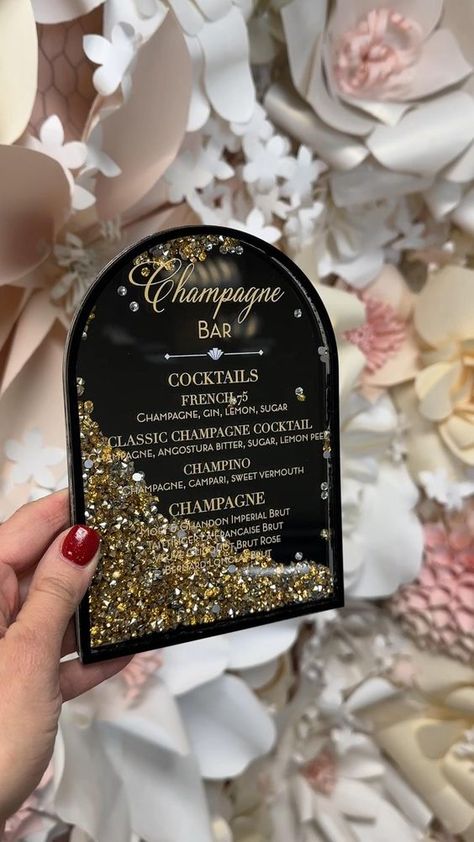 Dynamic elegance in motion! One of our bar signs, with mesmerizing gold and silver gems shimmering within. #boxedweddinginvitations #cocktailsign #barsign #weddinginspo #weddinginspiration #champagnecocktail #cocktails Winter Wedding Accessories, Diy Gifts To Sell, Making Wedding Invitations, Muslim Wedding Invitations, Box Wedding Invitations, Unique Wedding Cards, Wedding Design Decoration, Wedding Cards Handmade, Instagram Queen