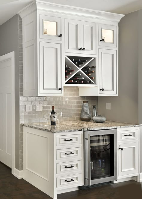 Custom beverage center with “X” wine rack and small refrigerator. Notice the beaded face frames, inset doors and panelized ends. Luxury White Kitchen, Rustic Farmhouse Kitchen Cabinets, Kabinet Dapur, Farmhouse Kitchen Cabinets, Kitchen Cabinets Decor, New Kitchen Cabinets, Rustic Farmhouse Kitchen, Butlers Pantry, Kitchen Cabinets Makeover