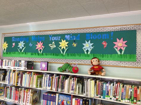 Spring bulletin board for libraries Library Bulletin Boards Elementary, Bulletin Boards Elementary, Spring Bulletin Board Ideas, Library Walls, Decorating Classroom, School Library Bulletin Boards, Bullentin Boards, Library Bulletin Board, Spring Bulletin