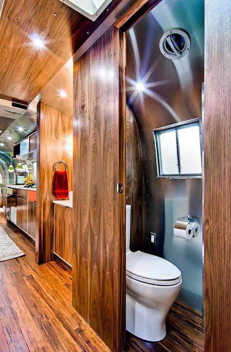 Airstream renovated into midcentury modern dream - Curbed Airstream Bathroom, Black And White Tiles Bathroom, Airstream Remodel, Chuck Box, Airstream Trailer, Airstream Interior, Airstream Renovation, Rv Bathroom, Cabin Wedding