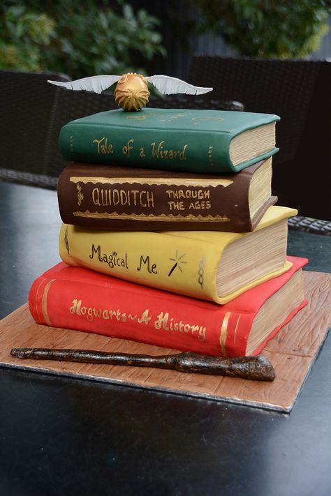 Harry Potter Party cake - Our version of a Harry Potter book stack cake with wand and golden snitch - for our Harry Potter party #harrypotterparty Book Stack Cake, Stack Of Books Cake, Quidditch Party, Hp Cake, Harry Potter Book Cake, Harry Potter Birthday Decorations, Harry Potter Graduation, Books Cake, Stack Cake