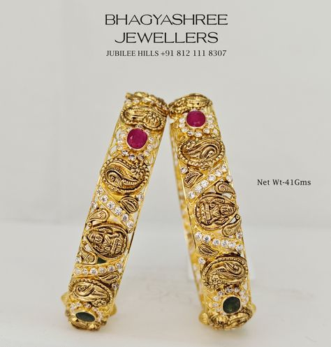 Beautiful Nakshi Bangles with perfect finishing. 100% percent exchange value for your old gold as per gold purity Visit us for a wide range of wedding sets in Gold and Diamonds. Please connect on us video call no 812 111 8307 for more wide range of collections from 11am to 8pm #bhagyashreejewellers #bhagyashree #goldjewellery #goldbangles #nakshibangles #bangles #bridalcollections #weddingsets #freeshippinginida #jubileehillsroadno36 #bridaljewelery #bridalbangles #weddingsets #bsjgold Bridal Jewelery, Beautiful Status, Bridal Bangles, Video Call, Gold Bangles, 100 Percent, Gold Jewelry, Bangles, Diamonds