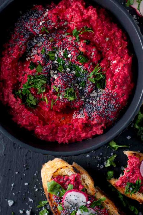 Beetroot hummus in a black bowl with toasted bread and lemon slices on the side. Cooked Beetroot, Healthy Dip Recipes, Beetroot Hummus, Mushroom Appetizers, Festive Appetizers, Christmas Recipes Appetizers, Healthy Dips, Delicious Appetizer Recipes, Homemade Hummus