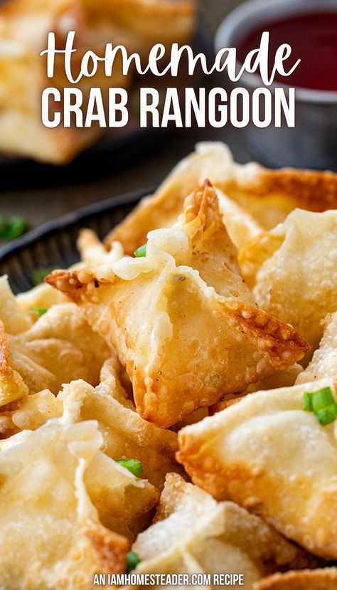 Many crab Rangoons are on a black plate, the plate is on a dark countertop. in the background you can see a cup of sweet and sour sauce, as well as a few other crab Rangoons. Homemade Crab Rangoon, Hosting Recipes, Crab Puffs, Crab Rangoons, Rangoon Recipe, Crab Rangoon Recipe, China House, Creamy Crab, Popular Appetizers