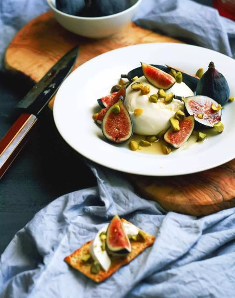 This little moment of lusciousness takes nothing to toss together. Just tear the figs, rip the cheese, and drizzle with oil. #figs #cheese #appetizer #burrata Brussels Sprouts Recipe With Bacon, Homemade Fig Newtons, Fig Dessert, Roasted Pistachios, Cheese Appetizer, Fig Recipes, Burrata Cheese, Cheese Pairings, Savory Appetizer