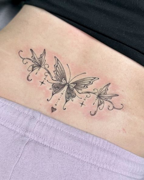 Dainty butterfly tramp stamp for Andra 🫧 Butterfly Lower Back Tattoo, Butterfly Tramp Stamp, Kelly Chen, Wheat Tattoo, Tramp Stamp Tattoos, L Tattoo, Henna Ideas, Dainty Butterfly, Black Girls With Tattoos