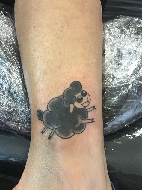 Little black sheep tattoo Cute Black Sheep Tattoo, Black Sheep Tattoos, Black Sheep Tattoo Ideas, Mums Tattoo, Black Sheep Tattoo, Atrapasueños Tattoo, Butterfly Ankle Tattoos, Mum Tattoo, Sheep Tattoo