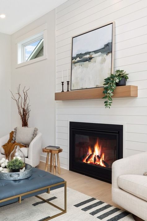 Fireplace, shiplap, white living room, floating mantle, square coffee table, coastal interior design. Fireplace Ideas Simple, Floating Mantle Fireplace, White Shiplap Fireplace, Coastal Fireplaces, Coastal Fireplace Ideas, Coffee Table Coastal, Fireplace Shiplap, Cottage Airbnb, Beach Fireplace