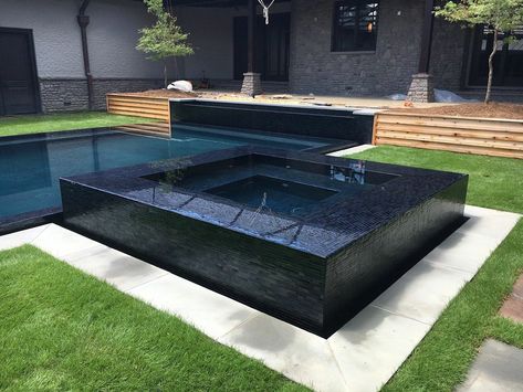 Pool Tile for Hot Weather Fun | Concept II Tile Store Black Tile Spa Pool, L Shape Swimming Pool Ideas, Pool With Black Tile, Black Pool Tiles, Choosing Pool Tile, White Pools, Spillover Spa, Modern Pool And Spa, Pool Surround