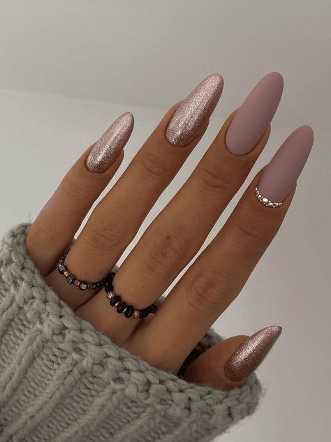 Rose gold is the ultimate chameleon. It doesn’t matter if you’re fair-skinned, olive-toned, or blessed with a deep complexion, this shade works its magic on everyone! Trust me, once you go rose gold, there’s no turning back. #rosegold #rosegoldnails Nude Nail With Design, Nails With Strass Sparkle, Nails With Strass, Nail With Design, Rose Gold Nails Glitter, Classy Almond Nails, Rose Gold Nails Design, Gold Chrome Nails, Gold Acrylic Nails