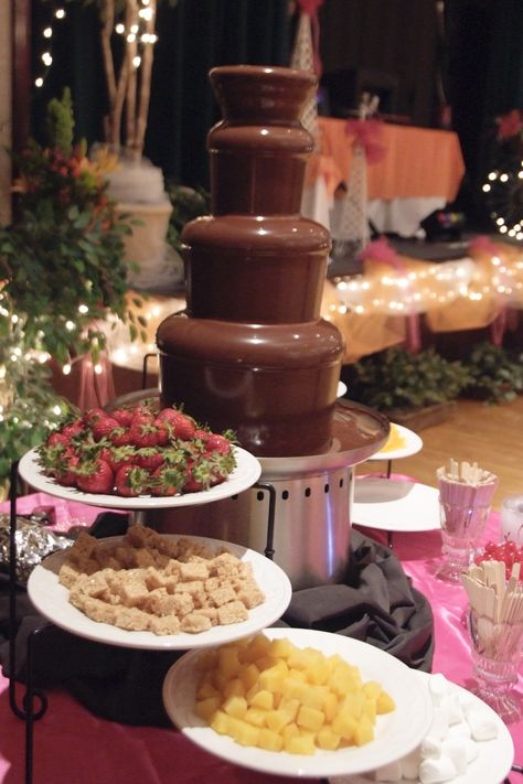 Chocolate Fountain Amanda do they have any serving trays like this at the venue? Sweet 16 Candy Buffet, Mini Chocolate Fountain, Ferrero Rocher Torte, Chocolate Fountain Wedding, Chocolate Fountain Bar, Chocolate Fountain Machine, Chocolate Fountain Recipes, Chocolate Fondue Fountain, Fondue Fountain