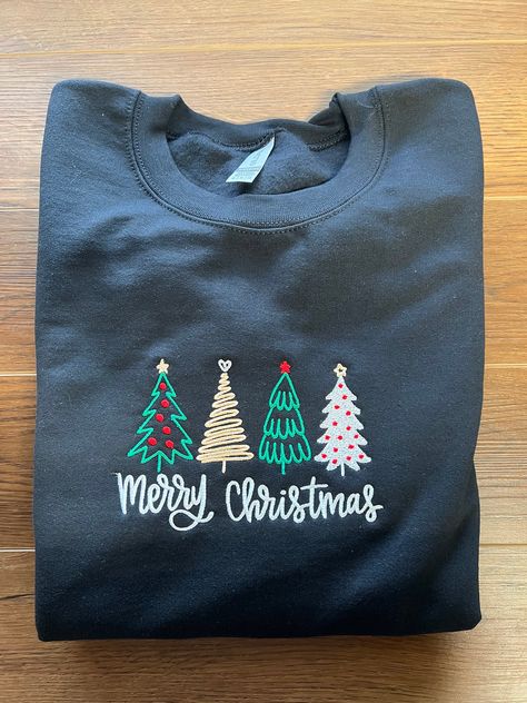 Show off your Christmas spirit with this embroidered 4 Christmas Tree sweatshirt! Christmas Embroidered Sweater, Embroidery Tshirt Ideas, Christmas Tshirt Ideas, Diy Sweatshirt, Embroidery Hoodie, Embroidery Sweatshirt, Applique Shirts, Embroidered Sweater, Embroidered Clothes