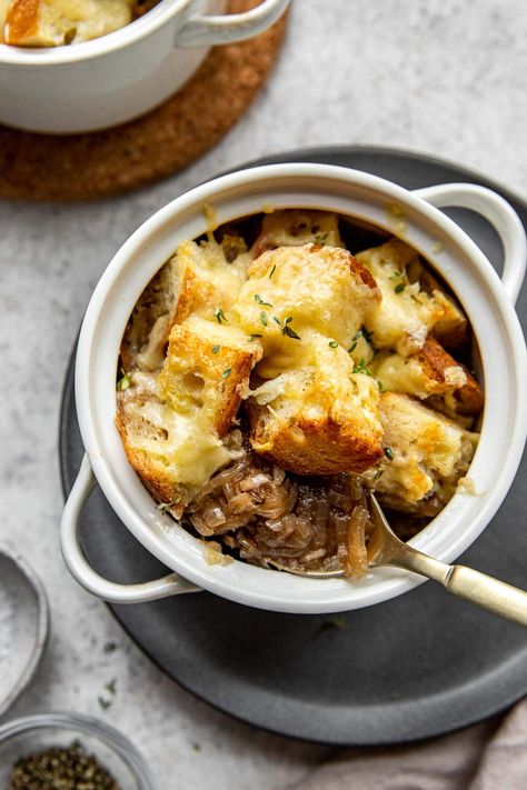 French Onion Soup is one of my all-time favorite soup recipes! This timeless classic is cozy and comforting, with a deep sweet onion flavor. Top with plenty of croutons and Gruyere cheese, then finish in an oven until the cheese is impossibly melty. Easily adaptable to be gluten-free and dairy-free. #wellseasonedstudio #onionsoup #frenchonionsoup #gruyerecheese French Onion Soup With Gruyere Cheese, Easy Soup Recipes Quick, Crockpot Soups, Classic French Onion Soup, Cozy Soup, French Onion Soup Recipe, Onion Soup Recipes, Easy Lunch Recipes, Gruyere Cheese