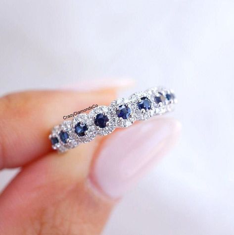 Blue Sapphire Full Eternity Band, 2.20MM Round Cut Sapphire Diamond With Halo Design Eternity Band, Stacking Matching Band, 18k Gold Band ✹✹𝐖𝐞𝐥𝐜𝐨𝐦𝐞 𝐭𝐨 𝐂𝐫𝐚𝐳𝐲𝐃𝐢𝐚𝐦𝐨𝐧𝐝𝐬𝐂𝐨✹✹ Detail about stones Gemstone : ----------------------------- Type: Sapphire Stone Shape: Round Cut Stone Size: 2.20 mm Weight: 1.00 TCW Color: Colorless Cut: Excellent Clarity: VVS ★ 𝑰𝒕𝒆𝒎 𝑫𝒆𝒕𝒂𝒊𝒍𝒔:- ☛ Metal Purity: Solid Gold (10KT, 14KT, 18KT); Silver(925 Sterling, 935 Argentium), 950 Platinum ☛ Metal Tone: Yellow, White, Rose ☛ Stamp/Hallmark: Yes ★ 𝑪𝒖𝒔𝒕𝒐𝒎𝒊𝒛𝒂𝒕𝒊𝒐𝒏:- ☛ Customized Design Jewelry. ☛ All cuts which you dream to make with moissanite. ☛ Updating every step of your ordered jewelry(Loose Stone, CAD & Making Process) ☛ All listed items in our stores are made to order. Sapphire Eternity Band Stacked, Eternity Band Stack, Sparkly Rings, Sapphire Eternity Band, Sparkly Ring, Eternity Rings, Halo Design, Platinum Metal, Eternity Band Diamond