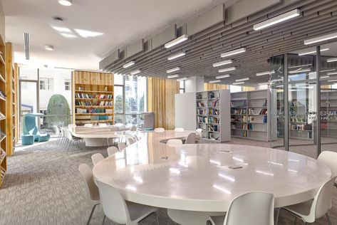 The HTU Library is an integral element of the university’s expansion. The library occupies the ground floor as a tranquil shared space, standing in deliberate contrast to the lively student lounge in the adjacent building, providing a peaceful sanctuary for focused study and innovation amidst the academic bustle. Architectural Design: @bureaupraxis #CampusDesign #StudySanctuary #MAInteriorDesigners #InteriorDesign Student Lounge, Campus Design, Ground Floor, The Expanse, Architecture Design, Lounge, Flooring, Interior Design, Architecture