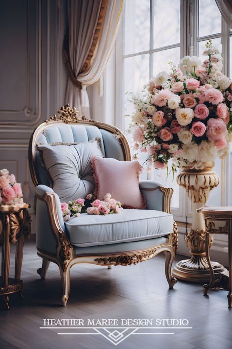 Admire the elegance of this antique baby blue aesthetic armchair, adorned with charming pink and blue pillows. The room is a vision of white and gold, perfectly accentuated by bouquets of delicate white and pink flowers. The large window bathes the space in sunlight, creating a timeless and maximalist ambiance | French Country | Wallpaper Backgrounds Pink Aesthetic | Coquette | Girly Things  | Vintage Aesthetic | Eclectic Decor | Room Inspo | Romantic Decor | Bridgerton | Blue aesthetic Country Wallpaper Backgrounds, Pink And Blue Pillows, Wallpaper Backgrounds Pink Aesthetic, Backgrounds Pink Aesthetic, Aesthetic Armchair, French Country Wallpaper, Manor Interior, White And Pink Flowers, Girly Apartment Decor