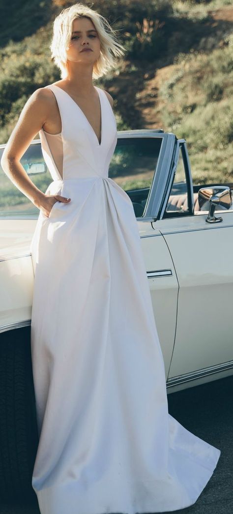 02 modern wedding dress with pockets made from couture silk with hand pleated panels and a plunging neckline - Weddingomania Stile Casual Chic, Chic Wedding Dresses, Minimalist Bride, Wedding Dress With Pockets, Minimalist Wedding Dresses, Silk Wedding Dress, White Wedding Dress, Back Wedding Dress, Gorgeous Wedding Dress