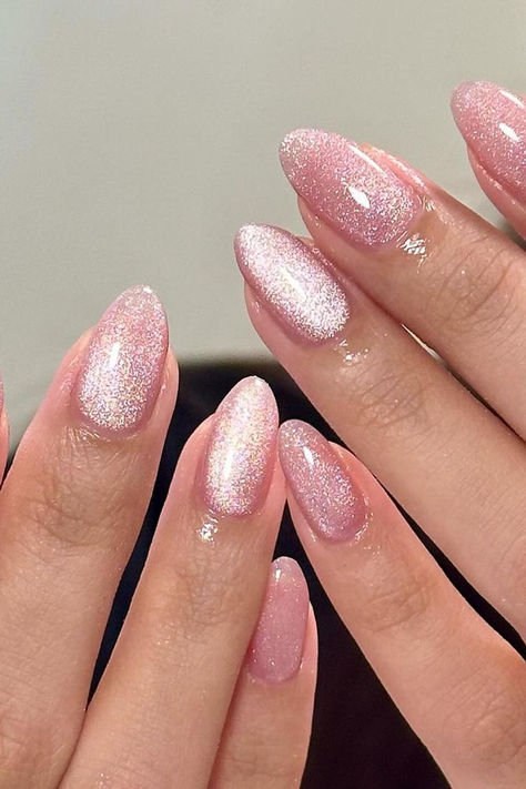 Radiant Elegance: Shimmering Pink Cat Eye Almond Nails exuding sophistication and charm 💖✨ // Photo Credit: Instagram @pallyynails Hoco Nails, Nagellack Trends, Nail Goals, Eye Nails, Cute Nail Ideas, Cat Eye Nails, New Nails, Sparkly Nails, New Year's Nails