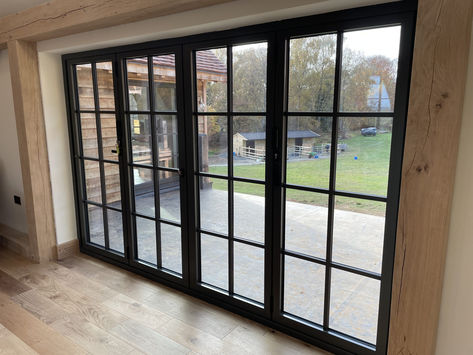 Crittal Style Patio Doors, Back Porch Windows And Doors, Sliding Iron Door Design, Industrial French Doors, Black Patio Doors Exterior, Different Window Styles, Patio Sliding Doors Ideas, Farmhouse Patio Doors, Black Steel Windows