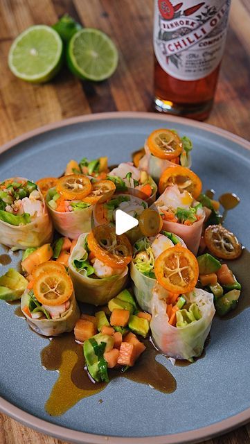 Reuben Riffel on Instagram: "Spring Prawn Rolls with Papaya Salsa

6 prawns, shelled and deveined 
@Banhoekchillioil
chopped ginger
Rice paper sheets
Sliced carrots
Sugar snap peas
Radish
baby cucumbers
Lime juice
Butter lettuce
Cashews, toasted and chopped
1/2 cup cubed avocado 
1/2 cup cubeBanhoeka 
Lime juice
coriander
1⁄4 cup Ponzu
1 tbsp honey
2 tbsp mirin
3 sliced kumquats

Method:
Coat the prawns in BCO, ginger and salt. Steam for 5-6 minutes and cool
Soak the rice paper in hot water until softened. On one side, layer the vegetables, a
prawn, lettuce, cashews and squeeze some lime juice. Roll the rice paper and tuck the
sides in before the final turn. Slice into 3 equal pieces.
Combine salsa ingredients
Mix ponzu, honey and mirin in a bowl. Add sliced kumquats and stir to combine
Se Prawn Rolls, Papaya Salsa, Ginger Rice, Sliced Carrots, Butter Lettuce, Salsa Ingredients, Sugar Snap Peas, Snap Peas, Summer Food