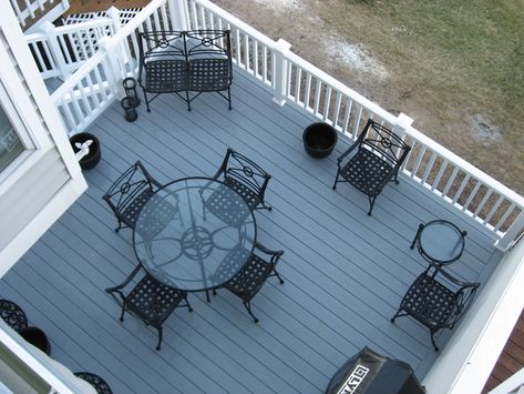 Blue Deck Ideas, Navy Blue Deck, Blue Deck Paint, Blue Deck, Gray Composite Deck Ideas, Composite Deck Colors For Gray House, Composite Decking Over Concrete Porch, Gray Composite Deck, Gray Trex Deck With Black Railing