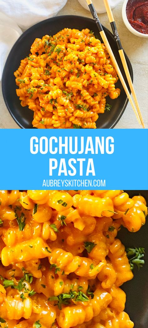 Gochujang pasta on a black plate with chopsticks. Gochujang Noodles With Chicken, Gochujang Recipe Pasta, Easy Dinner Recipes Korean, Gogugang Noodles, Korean Rose Pasta, Recipes With Date Paste, Creamy Gochujang Pasta, Gojuchang Pasta, Easy Korean Dinner Recipes