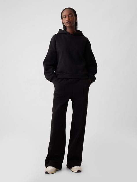 Soft fleece knit wide-leg sweatpants.  Elasticized waist.  Front slant pockets.  Seam at front.  Mid rise.  Straight silhouette with a relaxed fit.  Wide leg.  Models wearing Gap Wide Leg Sweat Set, Loungewear Black Women, Wide Leg Sweats Outfit, Black Sweat Set, Hoodie And Sweatpants Outfit, Skin Layers, Baddie Vibes, Extra Skin, Elevated Casual