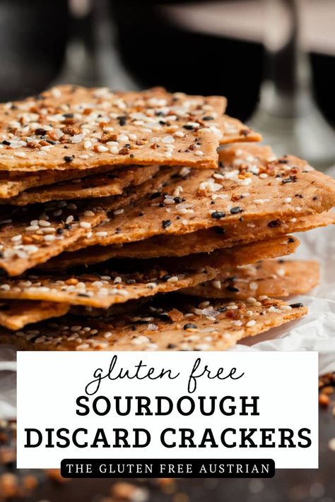 Gluten Free Sourdough Discard Crackers are a delicious way to repurpose excess gluten free sourdough starter and reduce food waste. These crackers, made from the discarded portion of a sourdough starter, boast a unique tangy flavor and a satisfying crunch. You may never want to eat store-bought crackers again - yes, these gluten-free crackers are that good. Gluten Free Sourdough Discard Crackers, Gluten Free Sourdough Crackers, Gluten Free Sourdough Starter Discard Recipes, Gluten Free Sour Dough Discard Recipes, Easy Gluten Free Sourdough Bread, Gluten Free Discard Sourdough Recipes, Gluten Free Crackers Recipe, Juniper Recipes, Gluten Free Sourdough Discard Recipes