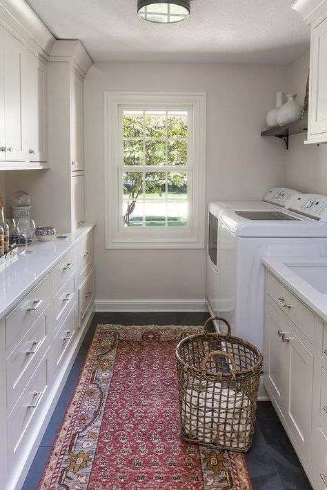 Traditional galley style laundry room features ivory shaker cabinets adorned with polished nickel hardware paired with white quartz countertops. Pantry Laundry Room Combo, Diy Laundry Room Storage, Laundry Remodel, Laundry Room Pantry, Laundry Room Storage Shelves, Pantry Laundry Room, Small Laundry Room Organization, Pantry Laundry, Room Storage Diy