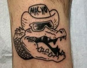 Cowboy Alligator Tattoo, Men’s Head Tattoo Ideas, Simple Gator Tattoo, American Traditional Alligator Tattoo, Alligator Head Tattoo, Small Alligator Tattoo, Alligator Skull Tattoo, Traditional Alligator Tattoo, Alligator Tattoos