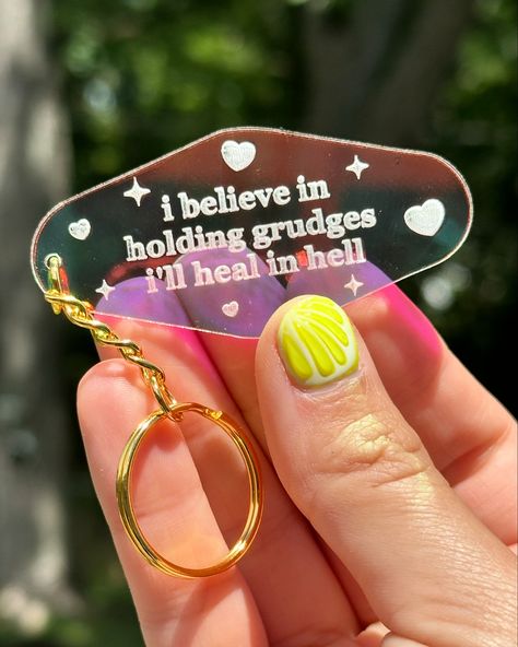 Fresh new photos of some of my keychains ✨ my keychains make fantastic gifts. They are all made and designed in house by ME. I use eye catching iridescent acrylic paired with a gold chain! My keychains are $12 and I sell them in my Etsy, Shopify and FAIRE. I have all sorts of dumb relatable phrases on them! Acrylic Keychain Design, School Works, Iridescent Acrylic, Keychain Acrylic, Glowforge Ideas, Edit Material, Kpop Ideas, Nails Jewelry, Keychain Ideas